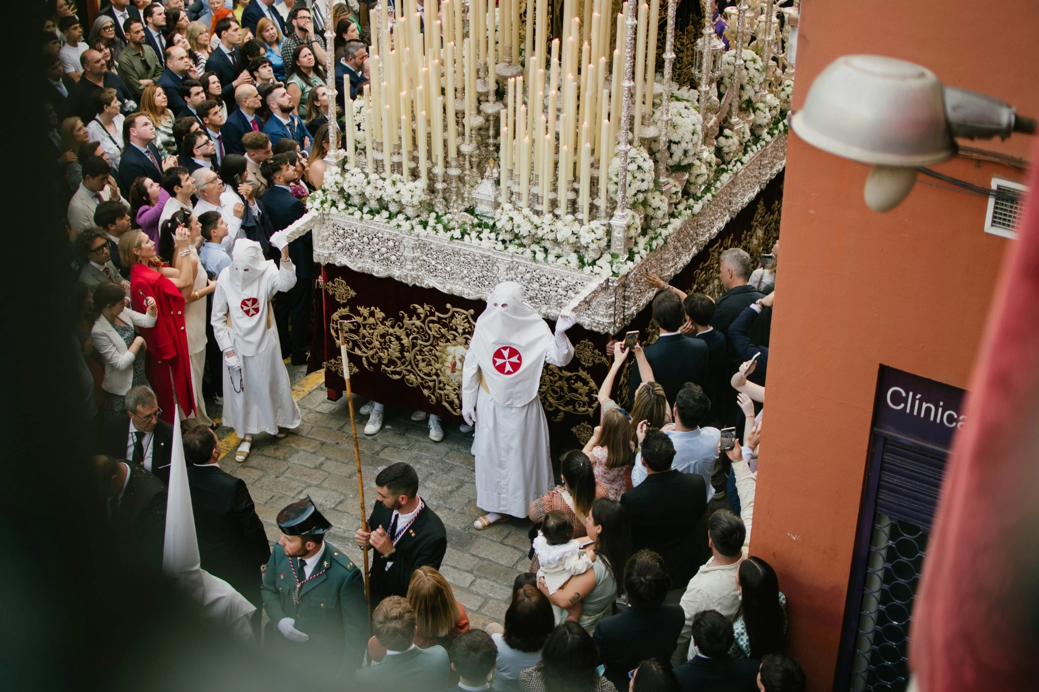 Semana Santa procession in Seville with palio float